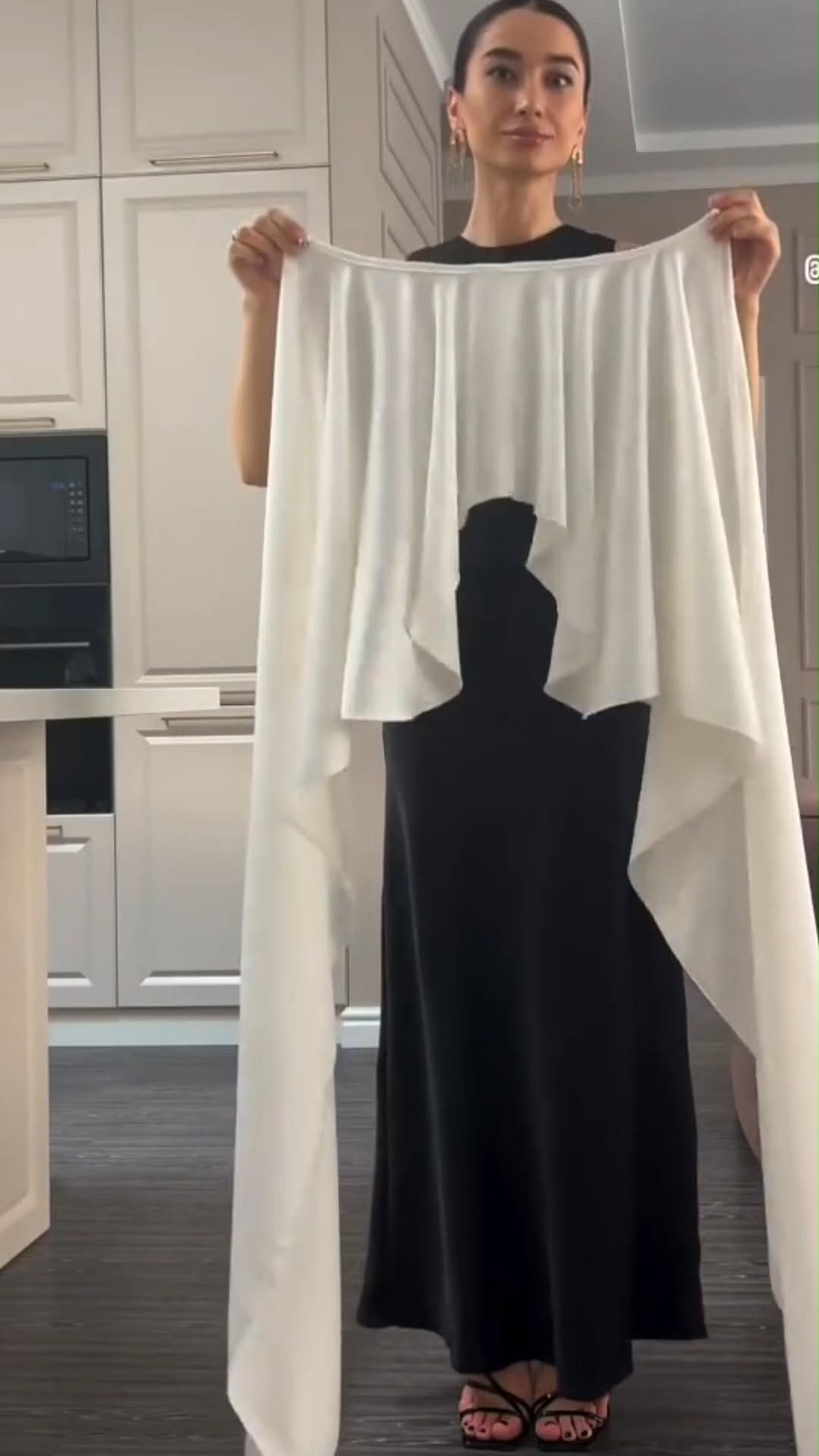 black and white cape gown